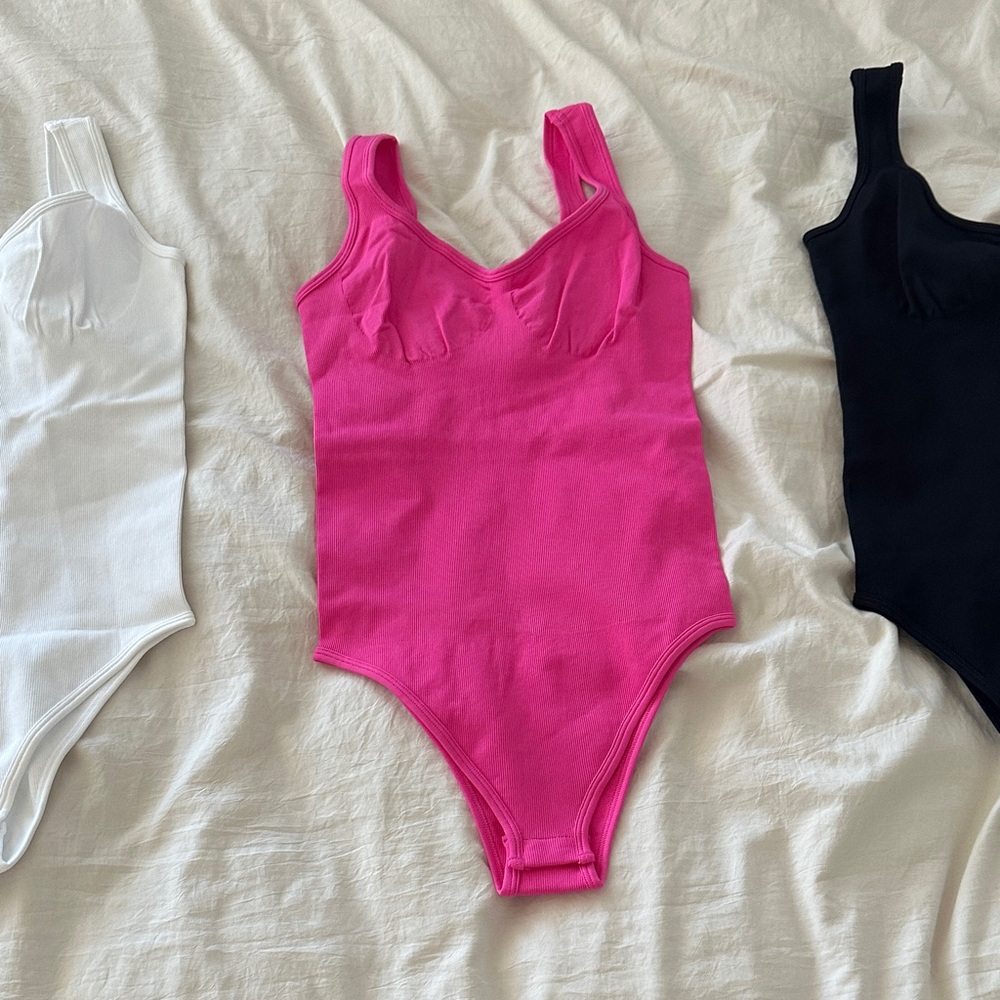 Pink black and white snatching bodysuits